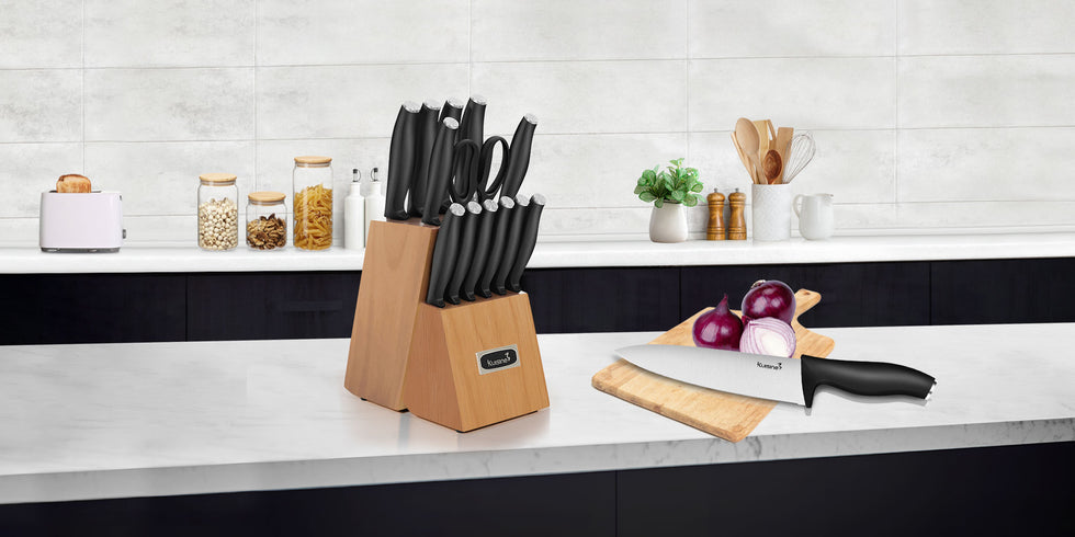 The Kuisine kitchen knife set features a unique built-in sharpener in its acacia wood block, making it easy to keep knives sharp and ready for any cutting task. This knife and block set’s each blade is crafted with a professional taper grind edge, ensuring optimal sharpness and precision for effortless cutting. With excellent craftsmanship evident in every knife, the kitchen knife and sharpener set provides added strength and durability, allowing you to tackle even the toughest cutting tasks with ease.