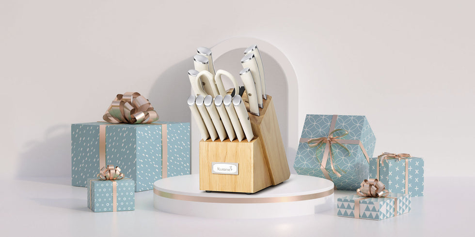 The Kuisine professional knife set ensures that each blade edge is honed to the optimal cutting angle for maximum sharpness, enhancing efficiency and saving time in everyday food preparation. The white block knife set features precision stainless-steel blades that resist stains and rust. Each knife is equipped with an ergonomic handle for a secure, comfortable grip, while full tangs and extra-wide forged bolsters provide excellent balance, stability, and control. With a built-in sharpener, this white kitche